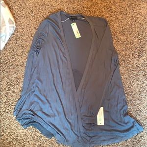 Blue cardigan with a mesh triangular back